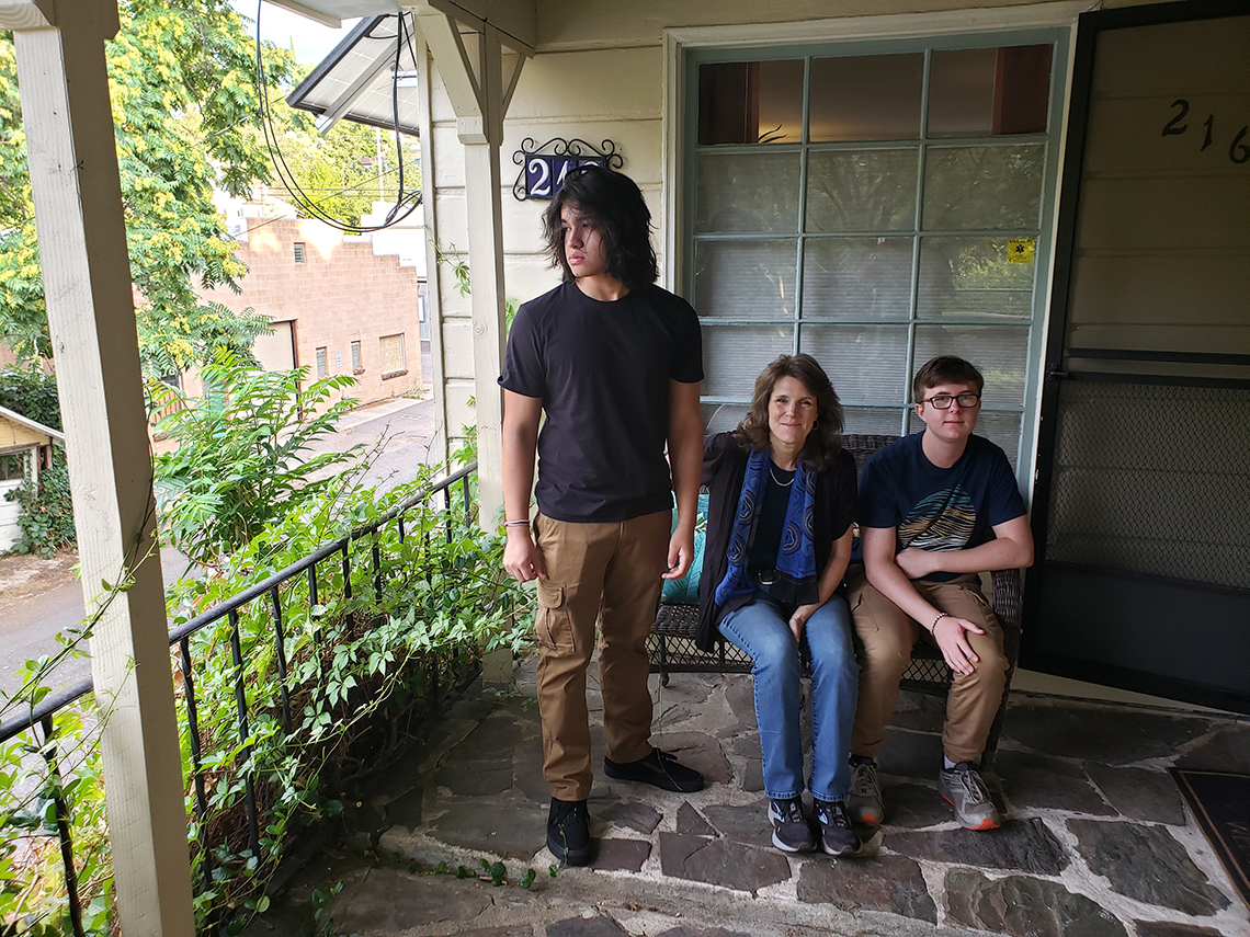 Kimberly with sons Alexander (standing) and James (sitting)